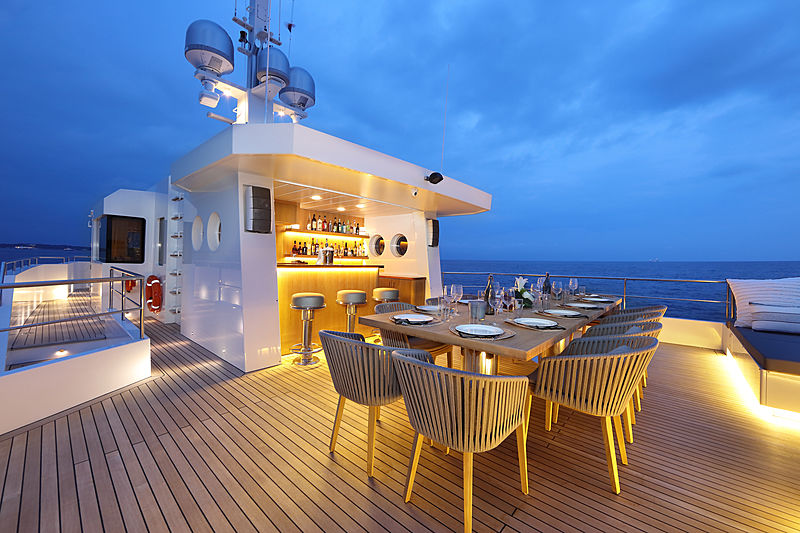 Siempre yacht aft deck at night