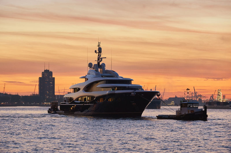 Oceanco Y715 towed by a tug