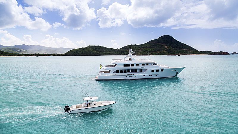 Mim yacht cruising with tender